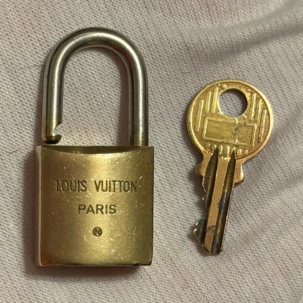 Louis Vuitton Gold Padlock with Key